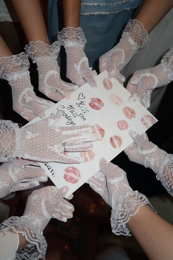 Gloved hands over greeting card