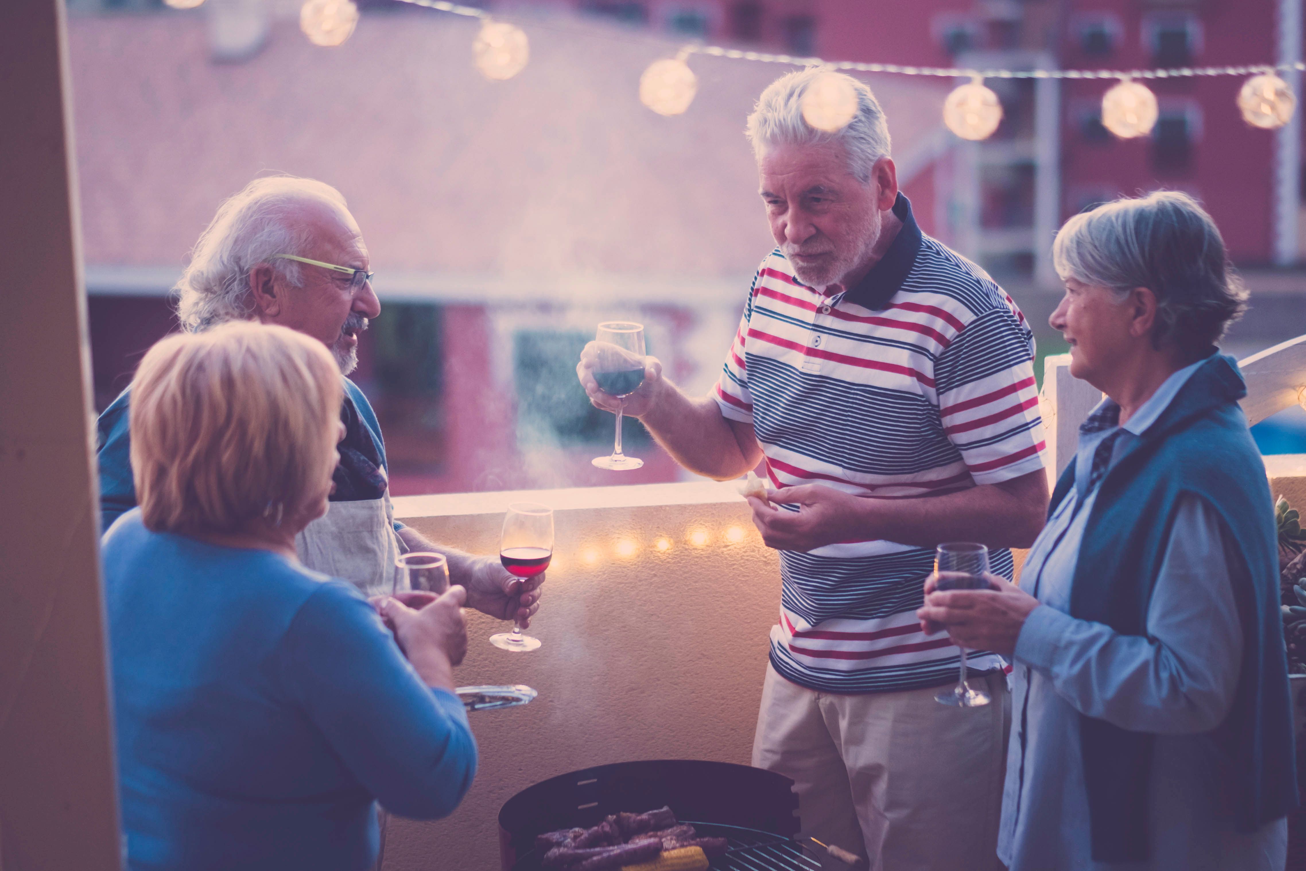 Seniors gather to chat around grill