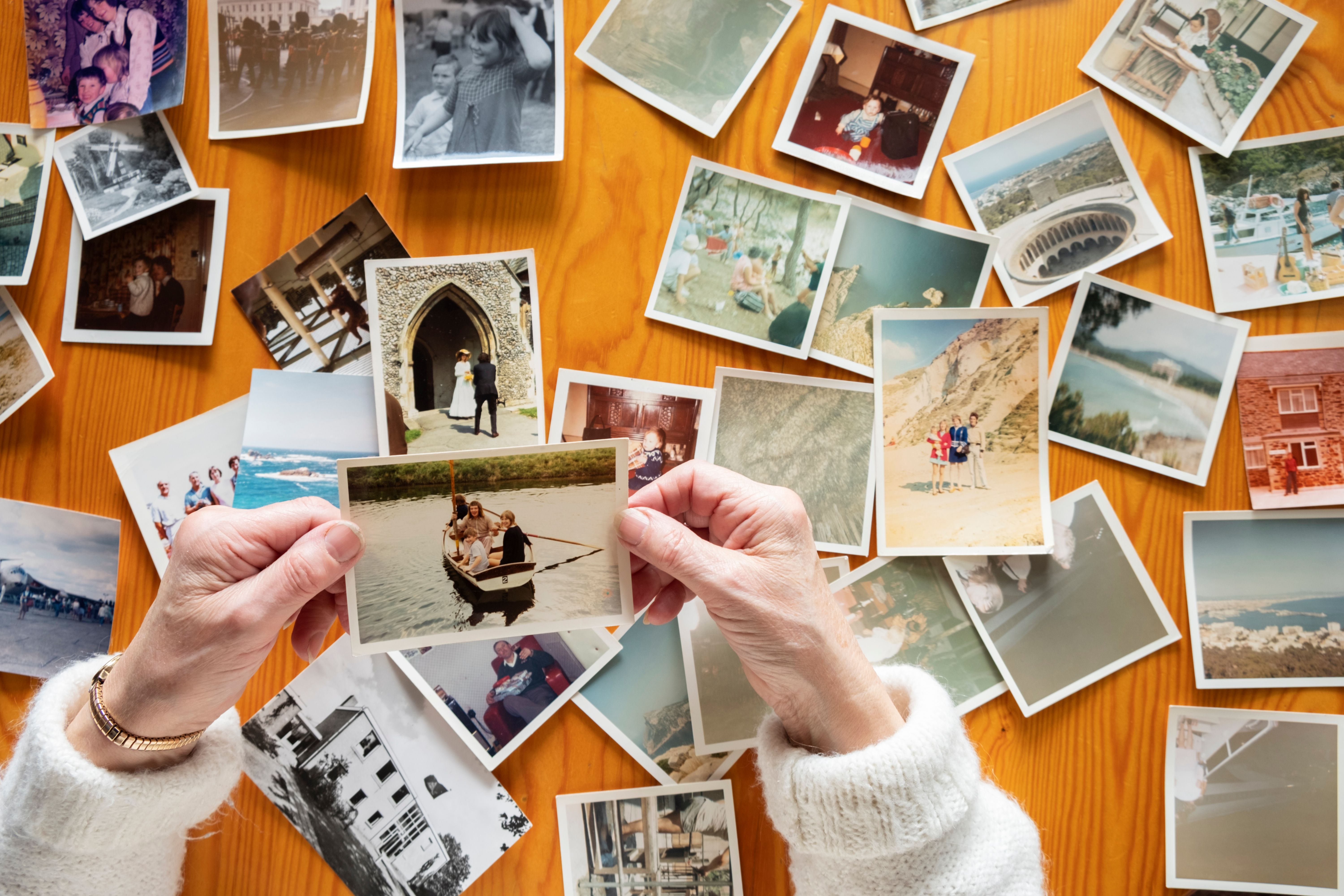 Person looking at family photos