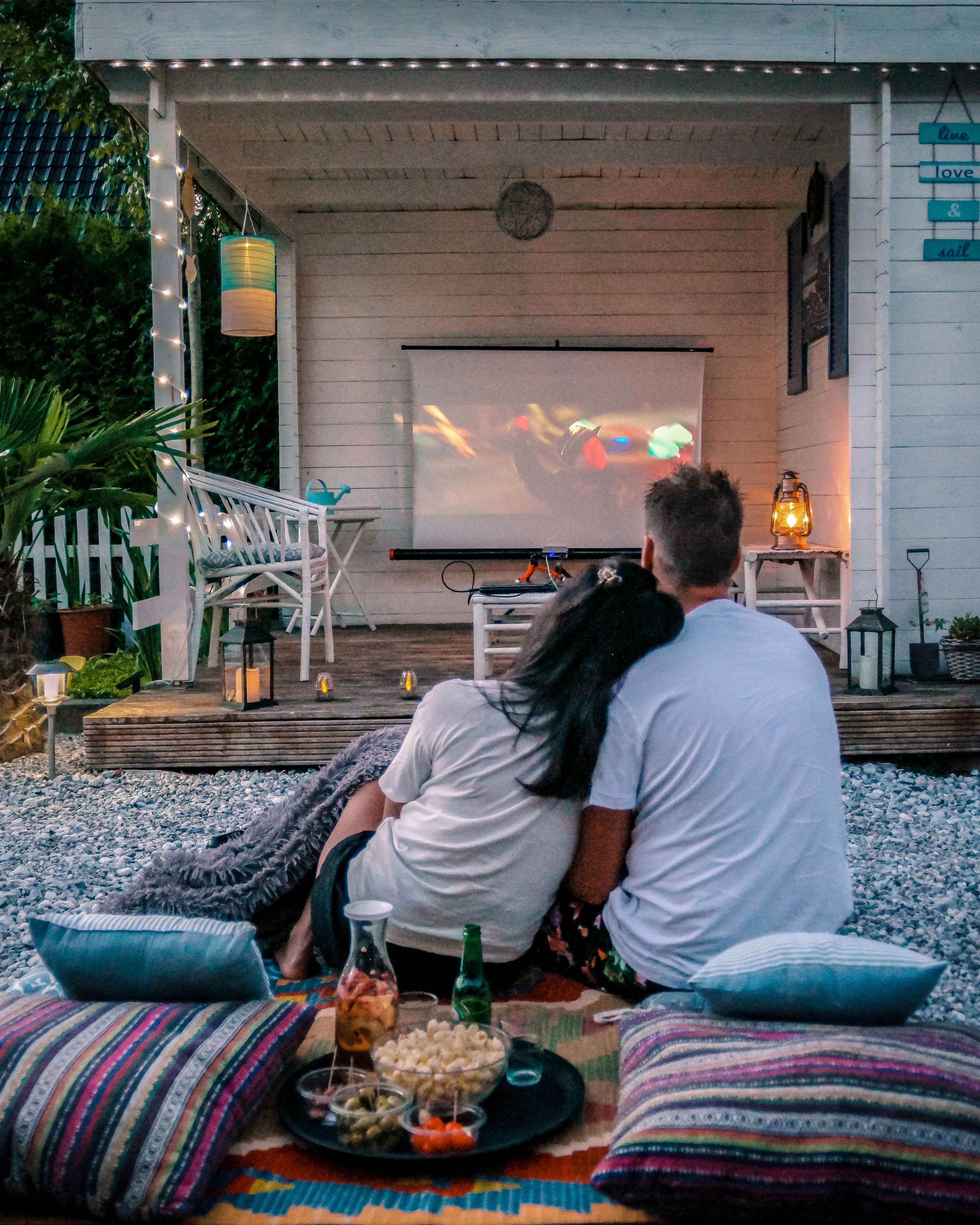 Couple enjoying outdoor movie night