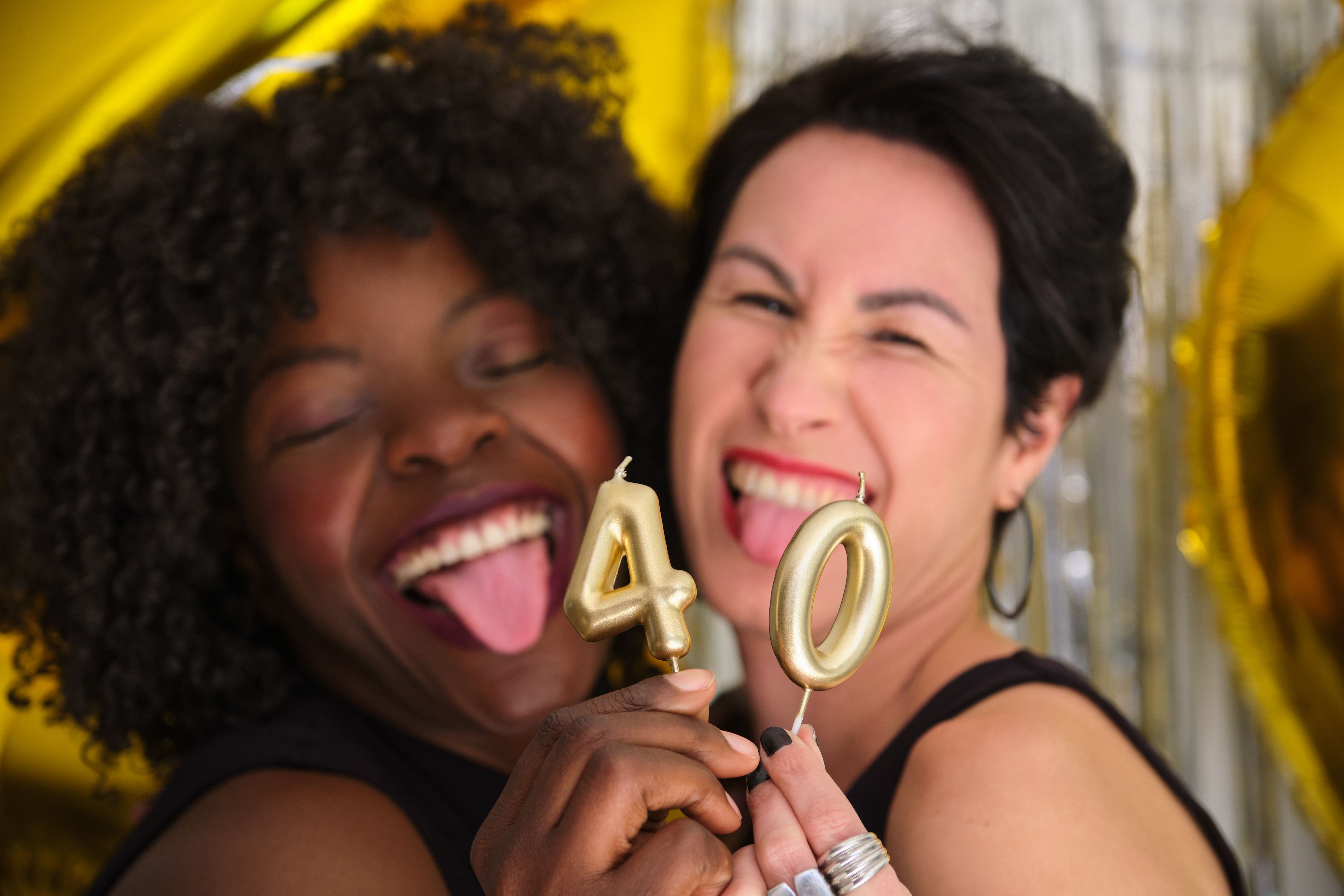 Two women in party photobooth