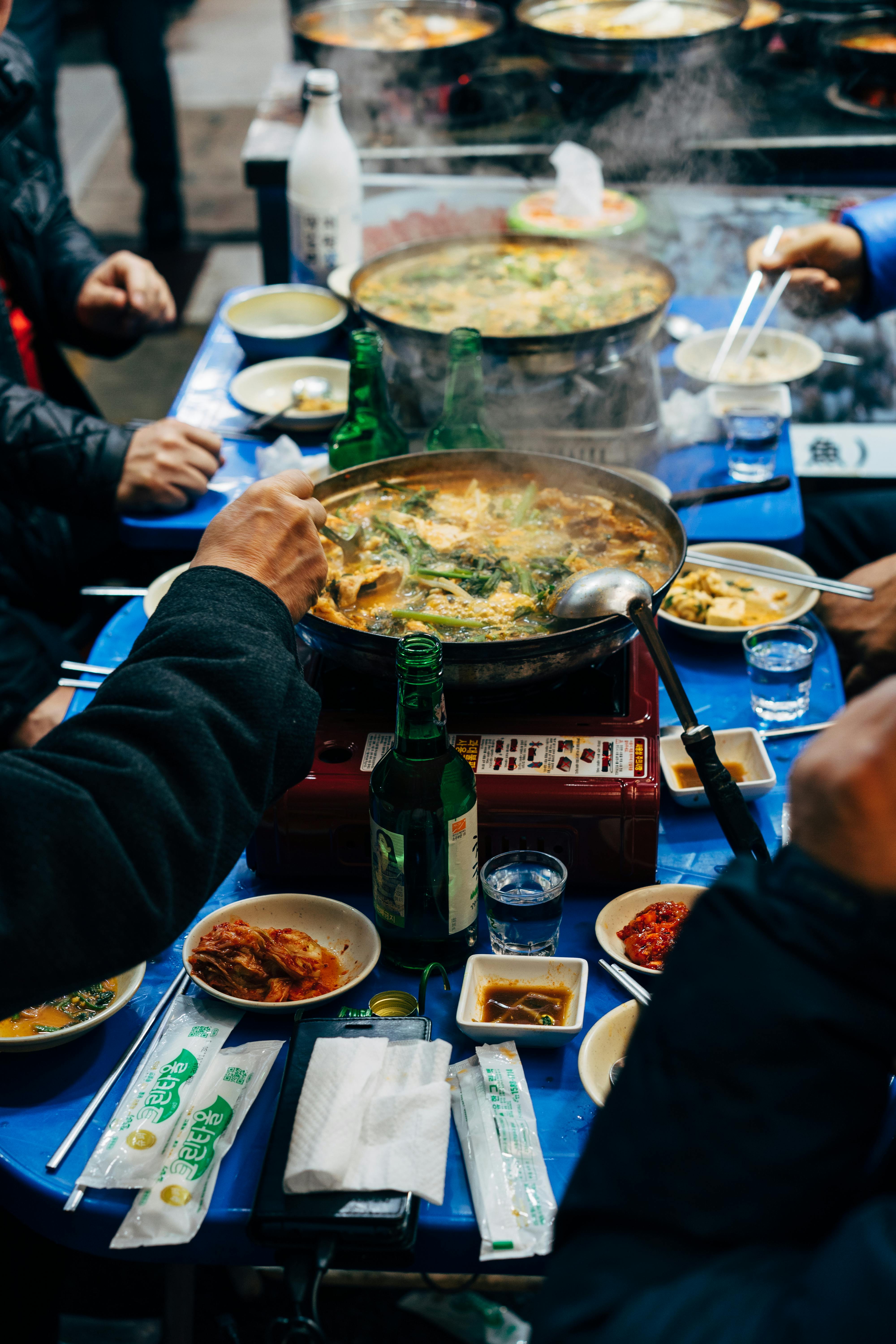 Picnic table with Asian food spread out